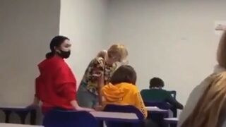Student Cowardly Attacks Teacher While She Wasn't Looking!
