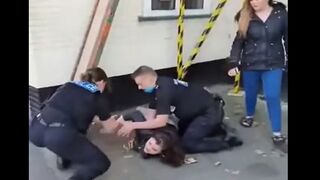 Wait for it...Cop Spartan Kicks Woman Interfering with Arrest