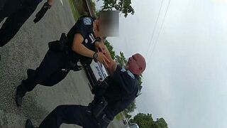 Male Officer Grabs Female Officer by the Throat and Chokes Her.