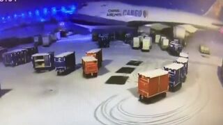 China Airlines Cargo Boeing 747-400F Crashes Into Baggage Carts During Taxi at Chicago Oâ€™Hare Airport.