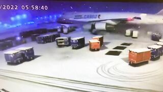 China Airlines Cargo Boeing 747-400F Crashes Into Baggage Carts During Taxi at Chicago Oâ€™Hare Airport.