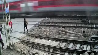 Dude Survives Getting Almost Hit By Train at Speed 130+ KMPH 
