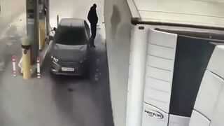 Man Trying To Protect His Car.