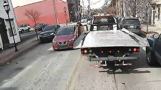 Shocking Video Shows Violent Punch that Drops Tow Truck Driver