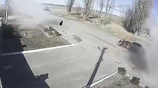 Russian Tank Blows Up Civilian Car, Kills Elderly Couple