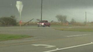 INSANE Footage Shows Pickup Truck Flipped By Tornado, Then Drive Away Like Nothing Happened