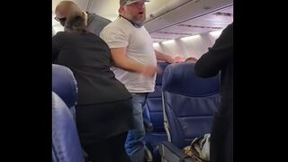 Heavyweight Has a Meltdown on a Plane, Begins Threatening Everyone Before Trying to Fight a Guy