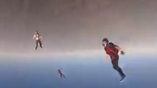 DAMN: Skydiver Gets knocked Out...Friend Saves Him in Mid-Air!