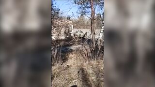Ukrainian Forces Appear to Execute the Driver of a Seized Russian Armo
