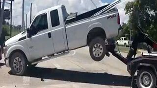 Guy Tries To Save His Truck From The Repo Man