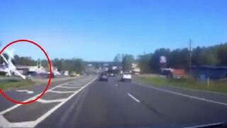 Incredible Footage Shows Moment Small Plane Clips Powerline and Crashes on Georgia Highway