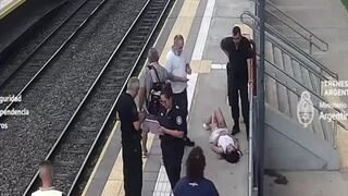  A Woman Fainted and Fell Onto the Train Tracks and Was Miraculously Saved 