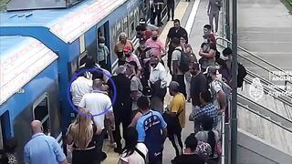 A Woman Fainted and Fell Onto the Train Tracks and Was Miraculously Saved 