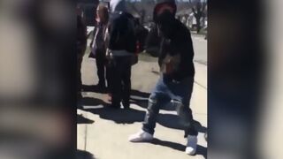 Teen Pretending to Have Gun While Walking into School Gets Beatdown by Students