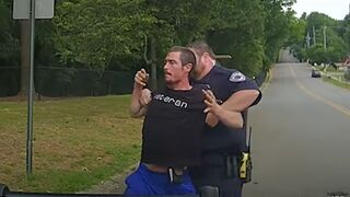 Out of Shape Cop Ends up Tasing Himself.