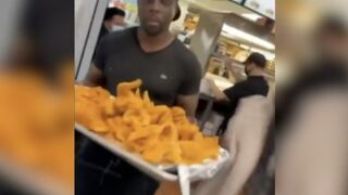 Thief Walks into a Restaurant Walks out With a Tray of Fried Chicken!