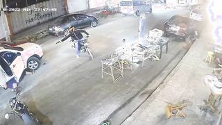 Dude Tries to Avoid Being Shot by Hitman...Fails