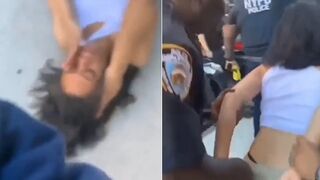 Woman Puts Her Hand on NYPD Officer During Arrest, Officer Punches the Soul Right out of Her