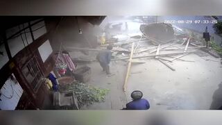 Massive boulder crashes through house in China.