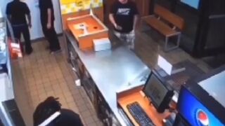 Morons Gun Discharges in his Pocket While in Line at Popeye's 