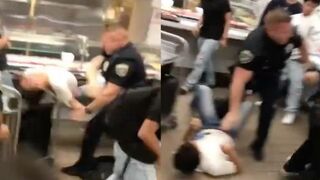 Police Officer Body Slams a High School Student onto a Cart While Breaking up a Fight.