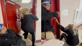 Teacher Punched in the Face by a Male Student after She Slammed a Classroom Door on His Arm!