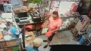 Feisty Convenience Store Owner Handles a Robber!