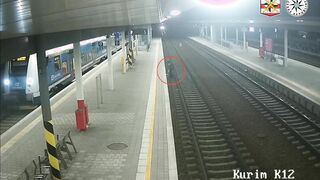 Man Somehow Survives Being Hit by Speeding Train While Stuck on the Tracks