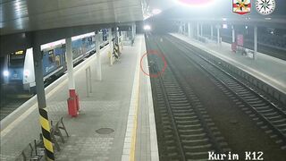 Man Somehow Survives Being Hit by Speeding Train While Stuck on the Tracks