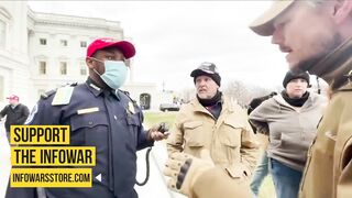Video From Jan 6th Shows Cop Wearing a MAGA Hat Asking Oath Keepers For Help.
