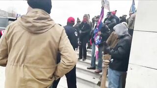 Video From Jan 6th Shows Cop Wearing a MAGA Hat Asking Oath Keepers For Help.