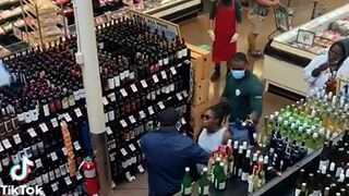 Woman Smashes Some Liquor Bottles When She's Busted Shoplifting by Security