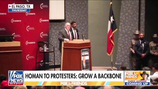 Tom Homan: "Call me what you want. I don't care." Man: "Traitor!" Homan: "You know