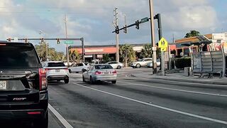 Close Call: Cyclist almost gets smacked by a car in Florida
