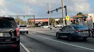 Close Call: Cyclist almost gets smacked by a car in Florida