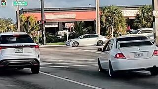 Close Call: Cyclist almost gets smacked by a car in Florida