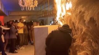 Fire Starts After a Sparkler Attached to a Drink Ignited Wall Decorations!