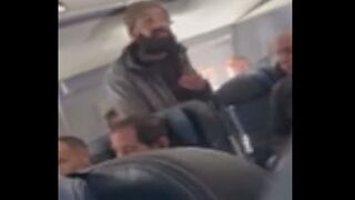 Out of Control Man Tries to Stab a United Airlines Crew Member