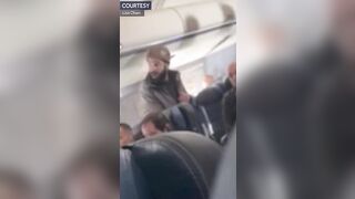 Out of Control Man Tries to Stab a United Airlines Crew Member