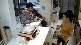 Female Employee Defends Herself With a Knife From Armed Robber!