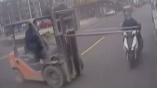 OUCH: Biker Gets Wrecked by a Forklift!