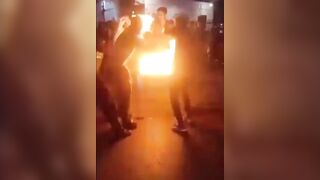 "Fire Eater" Accidentally Engulfs Himself & His Friend in Flames!