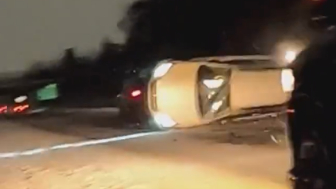 Car fails to move over and launches off tow truck ramp nearly hitting ...