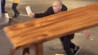 Man Trying to Attack People With a Cleaver Gets a Street Beatdown!