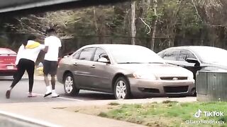 Couple Having Argument In Parking Lot Goes From 0 To 100 Fast!