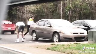 Couple Having Argument In Parking Lot Goes From 0 To 100 Fast!