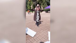 Angry Mask Wearing Tranny Flips Over Conservative Table Handing Out Pamphlets