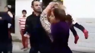 WTF: Horrible Woman Uses Child as a Weapon to Attack Man!