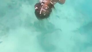 Hot Girl in Bikini Decides to Swim with Sharks.... Pays the Price