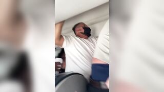 Two Dudes Brawl in the Airplane Aisle and on Top of Passengers